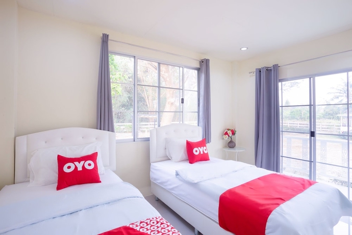 Imagen de la habitación del Hotel OYO 556 Chaisathan Cottage. Foto 12