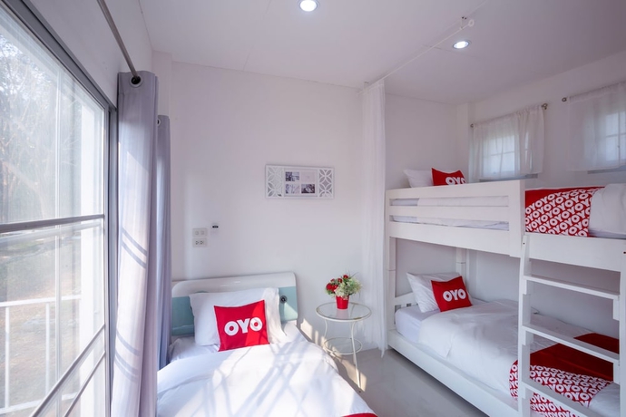 Imagen de la habitación del Hotel OYO 556 Chaisathan Cottage. Foto 13