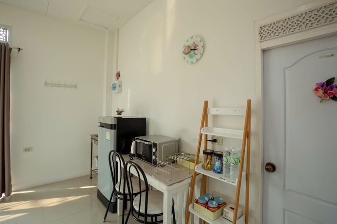 Imagen de la habitación del Hotel OYO 556 Chaisathan Cottage. Foto 14