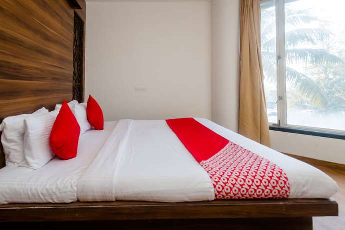 Imagen de la habitación del Hotel OYO 5699 Monarch Boutique. Foto 2