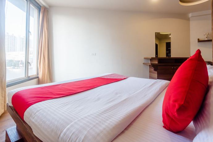 Imagen de la habitación del Hotel OYO 5699 Monarch Boutique. Foto 4