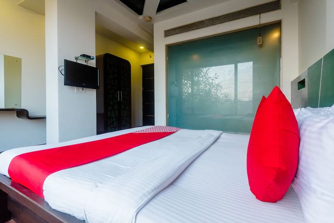 Imagen de la habitación del Hotel OYO 5699 Monarch Boutique. Foto 6