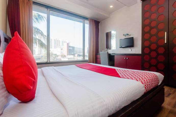 Imagen de la habitación del Hotel OYO 5699 Monarch Boutique. Foto 7