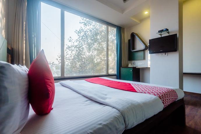 Imagen de la habitación del Hotel OYO 5699 Monarch Boutique. Foto 9