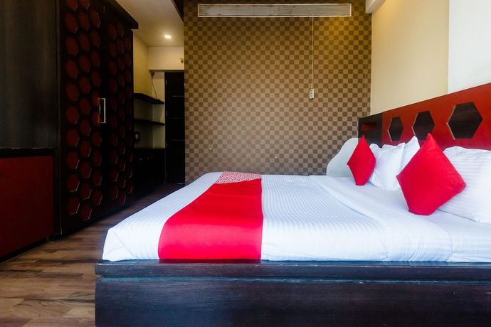 Imagen de la habitación del Hotel OYO 5699 Monarch Boutique. Foto 11