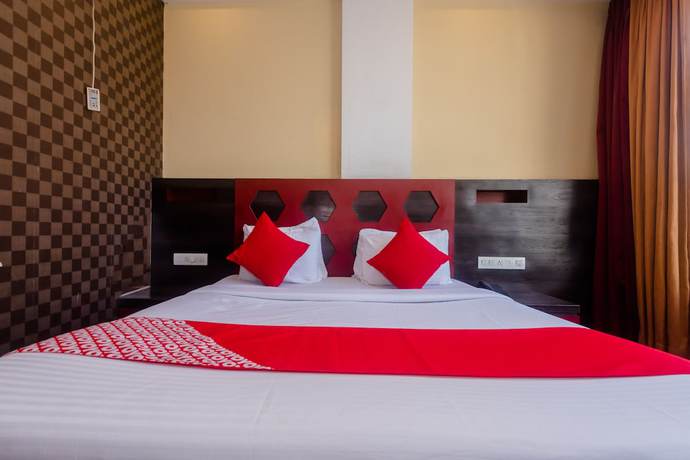 Imagen de la habitación del Hotel OYO 5699 Monarch Boutique. Foto 12