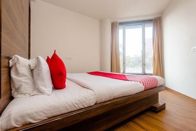 Imagen de la habitación del Hotel OYO 5699 Monarch Boutique. Foto 13