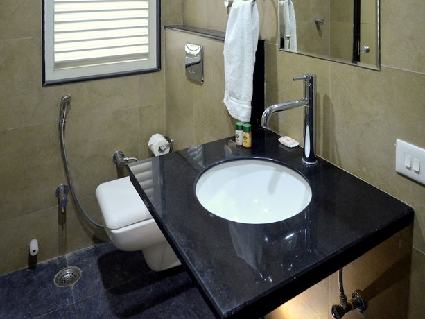 Imagen de la habitación del Hotel OYO 5777 The President. Foto 12
