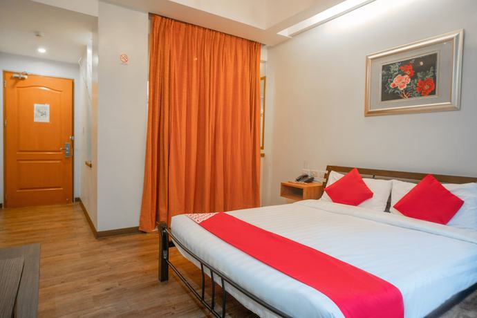 Imagen de la habitación del Hotel OYO 579 Anisabel Suites. Foto 4