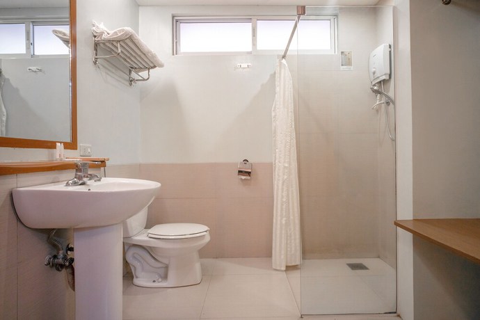 Imagen de la habitación del Hotel OYO 579 Anisabel Suites. Foto 6