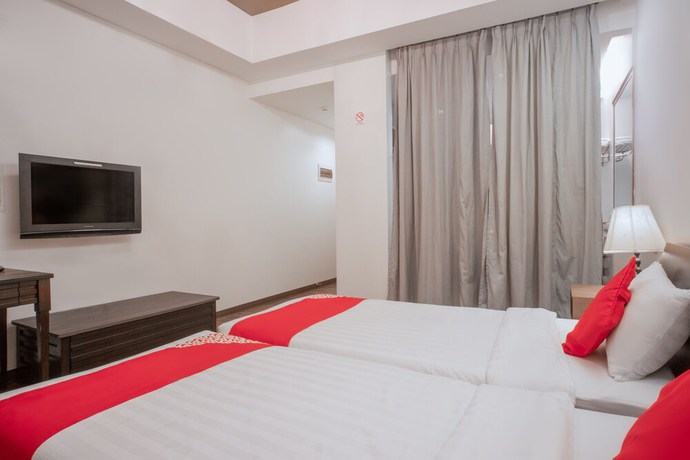 Imagen de la habitación del Hotel OYO 579 Anisabel Suites. Foto 9