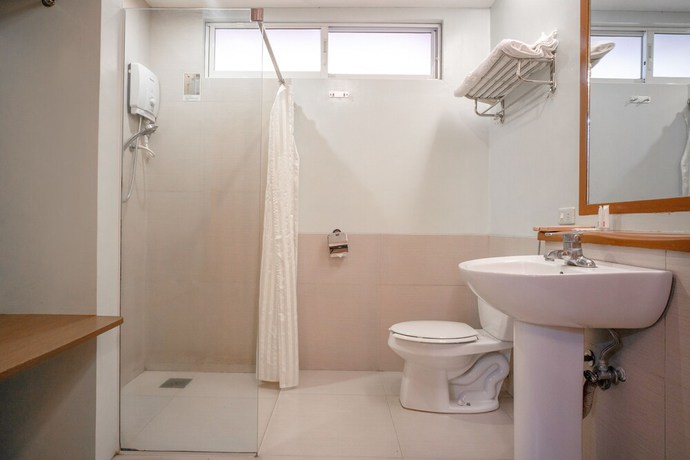 Imagen de la habitación del Hotel OYO 579 Anisabel Suites. Foto 10