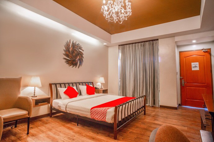 Imagen de la habitación del Hotel OYO 579 Anisabel Suites. Foto 11