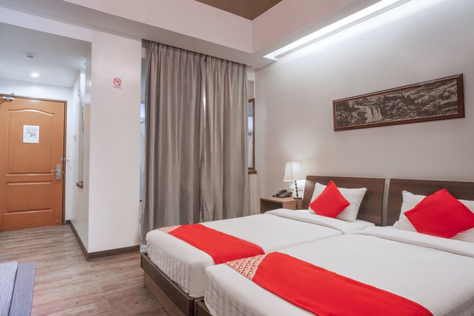 Imagen de la habitación del Hotel OYO 579 Anisabel Suites. Foto 14