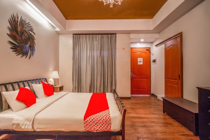 Imagen de la habitación del Hotel OYO 579 Anisabel Suites. Foto 15