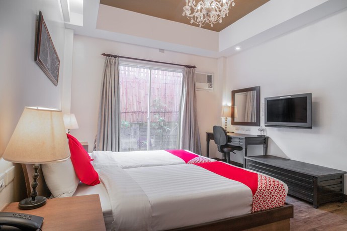 Imagen de la habitación del Hotel OYO 579 Anisabel Suites. Foto 16