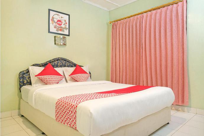 Imagen de la habitación del Hotel OYO 585 Hotel Perwita Sari. Foto 7