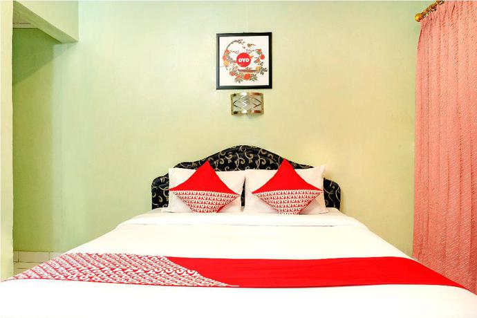 Imagen de la habitación del Hotel OYO 585 Hotel Perwita Sari. Foto 8