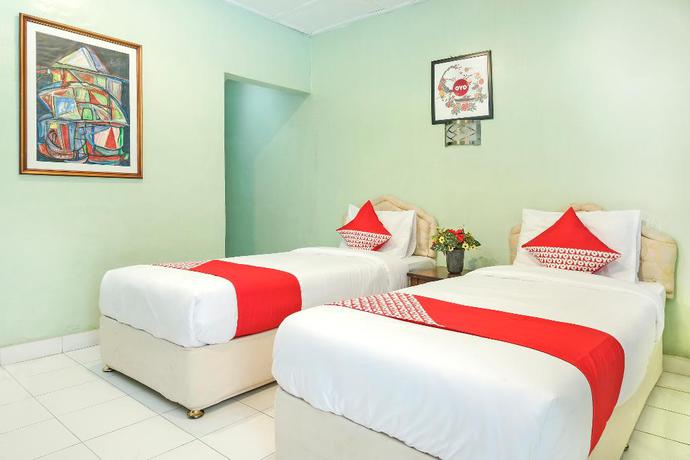 Imagen de la habitación del Hotel OYO 585 Hotel Perwita Sari. Foto 10