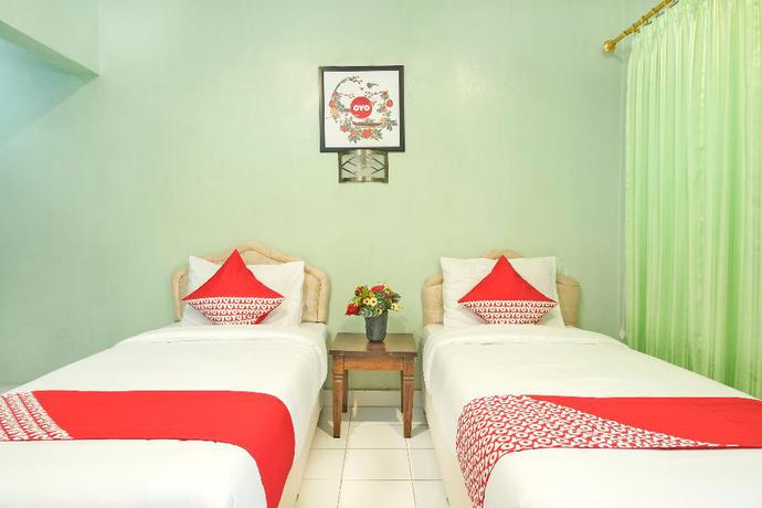 Imagen de la habitación del Hotel OYO 585 Hotel Perwita Sari. Foto 11
