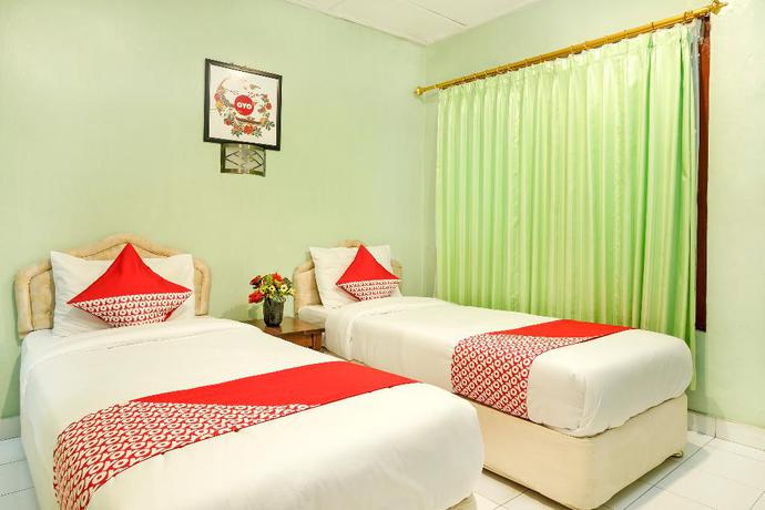 Imagen de la habitación del Hotel OYO 585 Hotel Perwita Sari. Foto 12