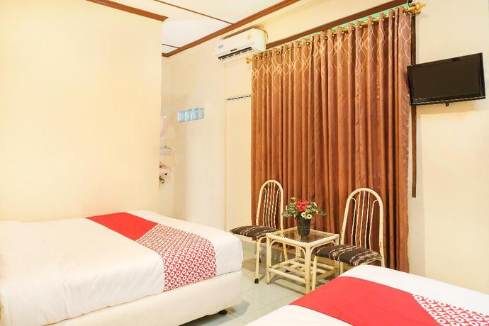 Imagen de la habitación del Hotel OYO 585 Hotel Perwita Sari. Foto 16