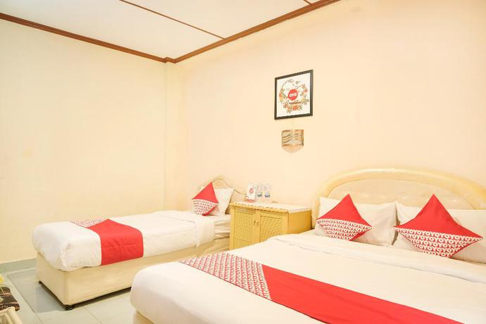 Imagen de la habitación del Hotel OYO 585 Hotel Perwita Sari. Foto 17