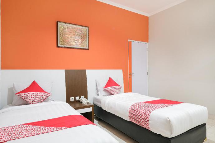 Imagen de la habitación del Hotel OYO 589 Hotel Desa Puri Syariah. Foto 7