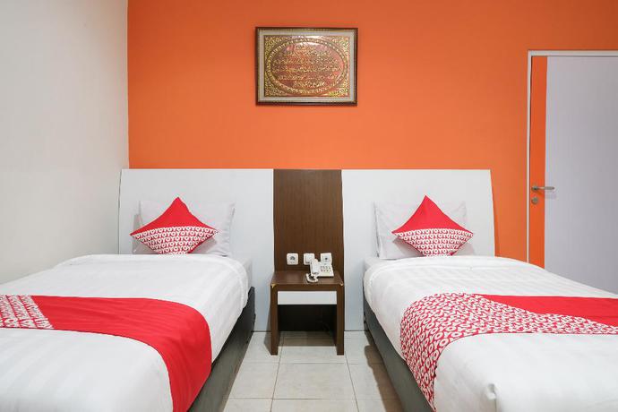 Imagen de la habitación del Hotel OYO 589 Hotel Desa Puri Syariah. Foto 8