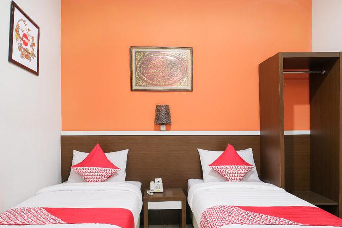 Imagen de la habitación del Hotel OYO 589 Hotel Desa Puri Syariah. Foto 9