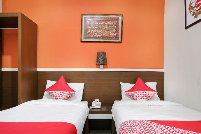 Imagen de la habitación del Hotel OYO 589 Hotel Desa Puri Syariah. Foto 11
