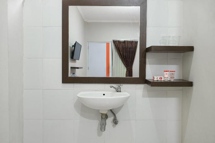Imagen de la habitación del Hotel OYO 589 Hotel Desa Puri Syariah. Foto 12