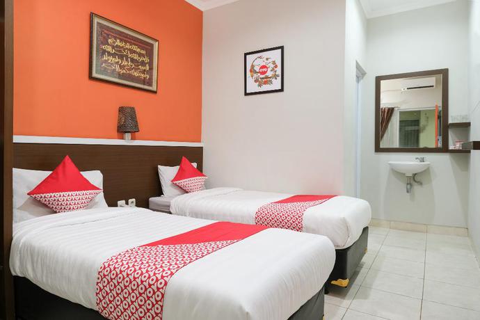 Imagen de la habitación del Hotel OYO 589 Hotel Desa Puri Syariah. Foto 14