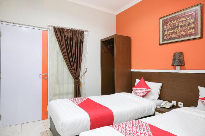 Imagen de la habitación del Hotel OYO 589 Hotel Desa Puri Syariah. Foto 16