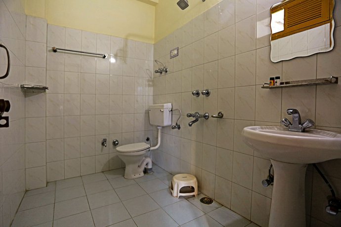 Imagen de la habitación del Hotel OYO 5910 Anupam. Foto 9
