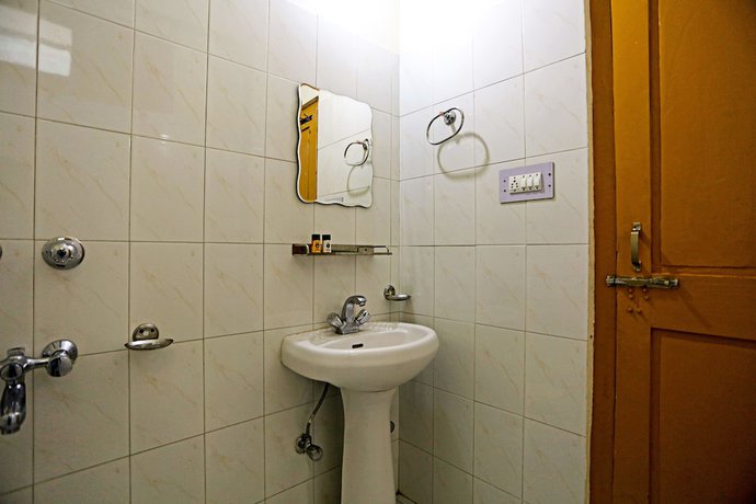 Imagen de la habitación del Hotel OYO 5910 Anupam. Foto 12