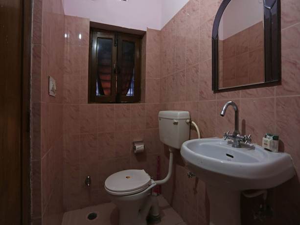 Imagen de la habitación del Hotel OYO 6001 City Palace. Foto 7