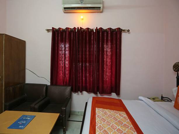 Imagen de la habitación del Hotel OYO 6001 City Palace. Foto 8