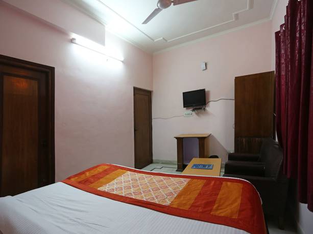 Imagen de la habitación del Hotel OYO 6001 City Palace. Foto 10