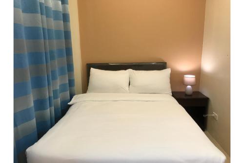 Imagen de la habitación del Hotel OYO 601 Guest. Foto 4