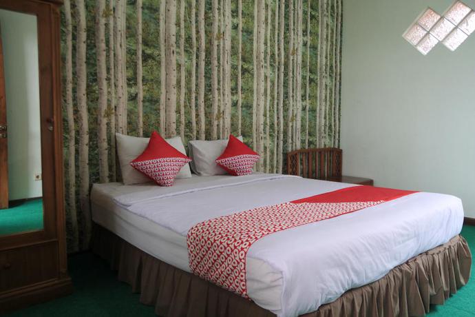 Imagen de la habitación del Hotel OYO 602 Hotel Hikmat Indah. Foto 3