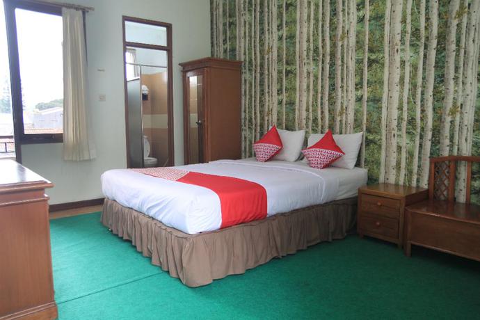 Imagen de la habitación del Hotel OYO 602 Hotel Hikmat Indah. Foto 5