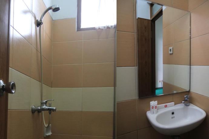 Imagen de la habitación del Hotel OYO 602 Hotel Hikmat Indah. Foto 6