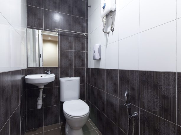 Imagen de la habitación del Hotel OYO 604 Est Equine Park. Foto 11