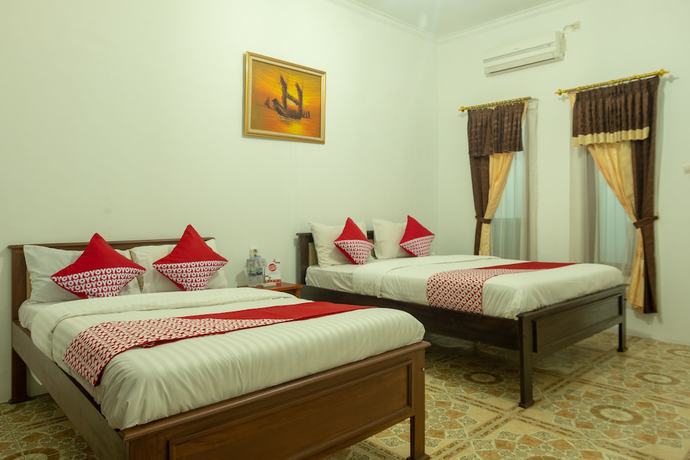 Imagen de la habitación del Hotel OYO 609 Ms Pangandaran. Foto 2