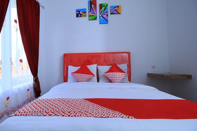 Imagen de la habitación del Hotel OYO 609 Ms Pangandaran. Foto 11