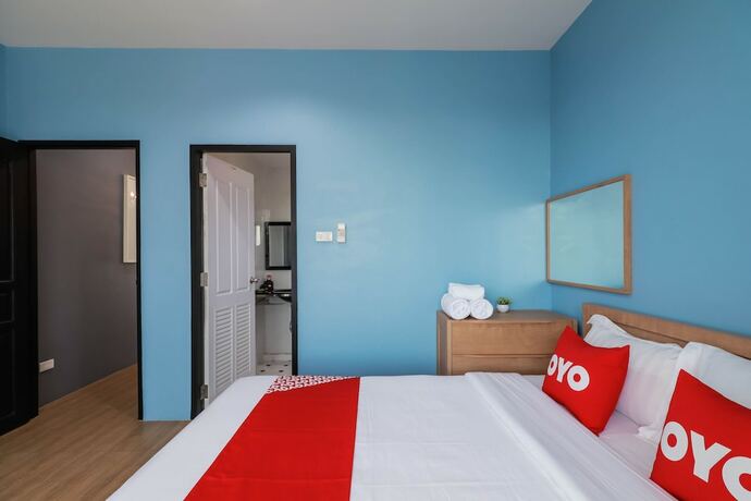 Imagen de la habitación del Hotel OYO 611 Stay Young Villa. Foto 11