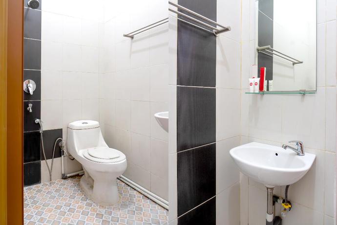 Imagen de la habitación del Hotel OYO 617 Sukaraja Residence Syariah. Foto 5
