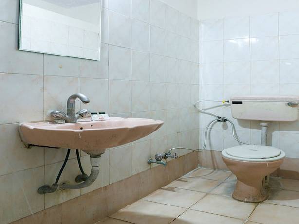 Imagen de la habitación del Hotel OYO 62100 Hill Top. Foto 5