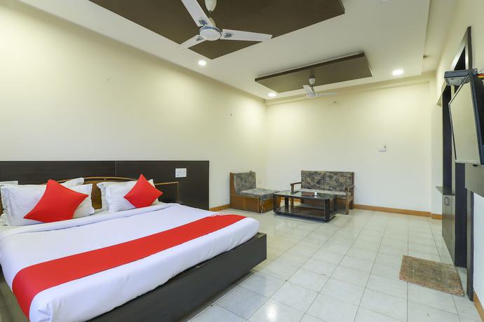 Imagen de la habitación del Hotel OYO 62100 Hill Top. Foto 12